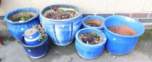 Six ceramic blue planters.