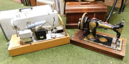 A Frister & Rossmann model 46 electric sewing machine, and a Jones Family sewing machine, both cased