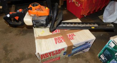 An S Star hedge trimmer, petrol driven, model number THT2100SB. and a Dovetail trimmer in box.