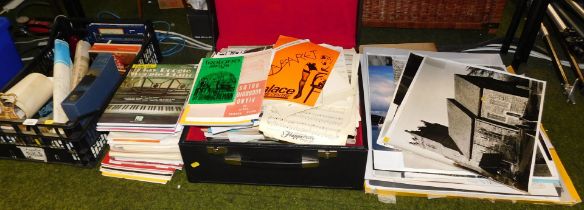 A quantity of sheet music, posters, and a box of miscellaneous items.