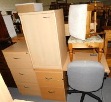 An office desk and chair, the desk with two drawers, a filing cabinet, small stool, an upholstered c