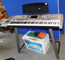 A Yamaha Professional work station 9000 Pro, with stand, and Yamaha YSTMS50 powered multi media spe