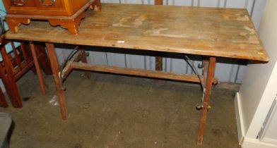 A plank top kitchen table