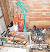 Assorted tools, to include strimmer, a bench grinder, a box containing saws and other tools. Buyer N