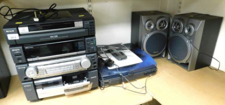 An Aiwa stacking stereo system, comprising a disc direct play, play amp, tuner, twin cassette decks,