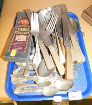 Silver plated knives forks and spoons.