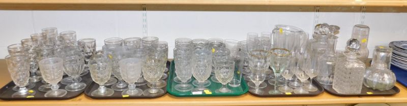 Glassware to include decanters, jugs, pint glasses, large sundae dishes, wine glasses, goblets and f