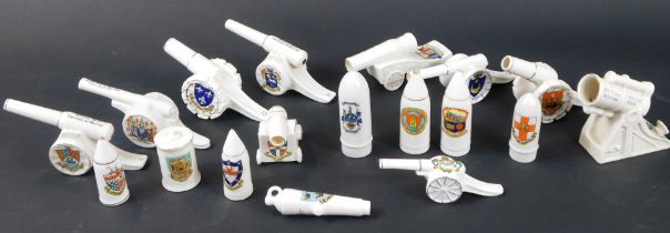 A collection of crested china World War One Artillery guns and cannons, and some armaments, to inclu