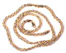 A 9ct gold fancy link necklace and bracelet set, of bi-colour twist design with silver, gold and ros