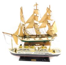 A wooden model ship, of a three masted clipper Siglo XIV, on rectangular wooden base, 53cm high, tog