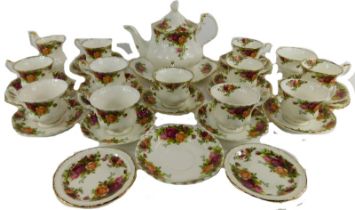 A group of Royal Albert part teawares decorated in the Old Country Roses pattern, comprising teapot,