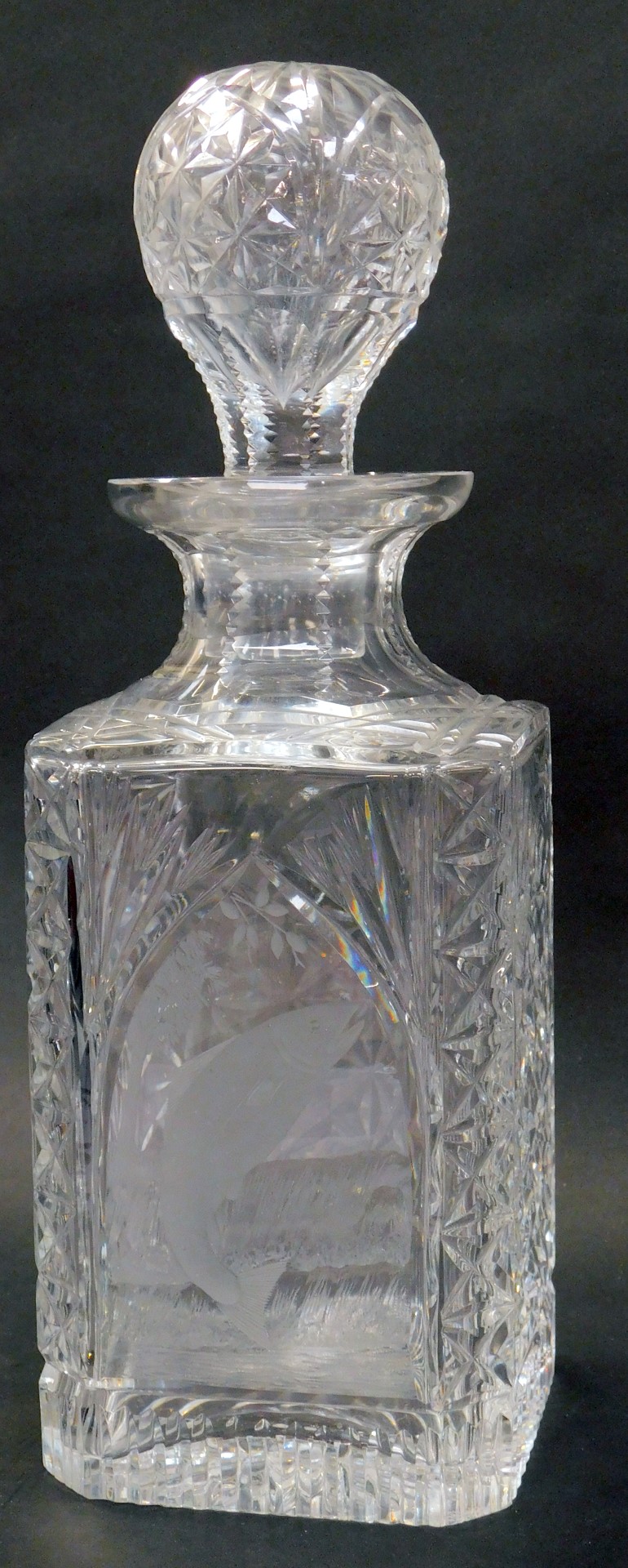 An Edinburgh crystal magnum sized cut glass spirit decanter from the Caledonia Collection, engraved
