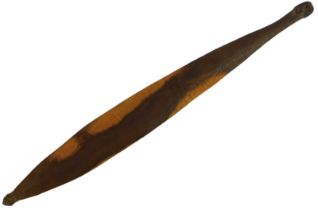 An aboriginal wooden Woomera, for launching long throwing spears, of shaped form with incised waved