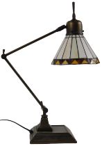 A Tiffany style Anglepoise type lamp, leaded glass shade, of circular tapering form with milk glass
