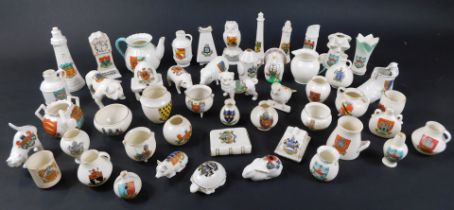 A collection of various crested china ornaments, to include W H Goss, Carlton China, Willow Art, and