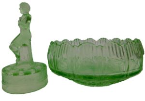 An Art Deco style moulded green glass flower bowl, central section modelled as a female nude seated