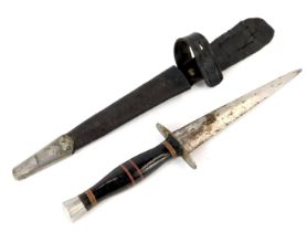 A fighting knife, with leather bound grip and alloy pommel, with leather sheath.