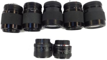 A quantity of Praktica camera lenses, various models, to include PB, etc., and two Sigma lenses. (7)