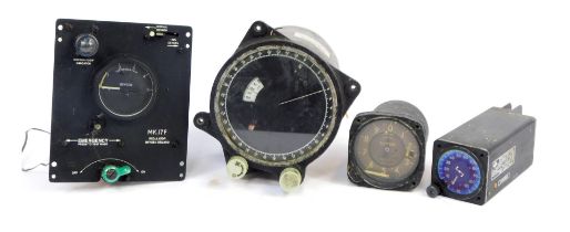 A group of aviation dials, to include a GM Compas MK7 Master indicator, a Kollsman altitude meter, a