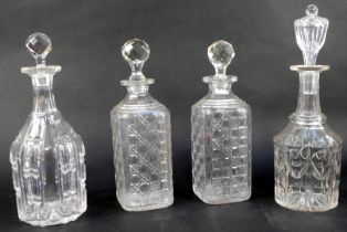 Four cut glass decanters, to include a pair of square cut decanters and stoppers, 28cm high, a 19th