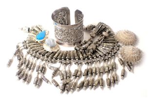 A group of costume jewellery, comprising an Eastern inspired choker, matching bracelet, a hammered b