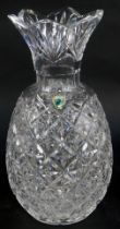 A Waterford crystal cut glass vase, modelled as a pineapple, with paper label, 31cm high.