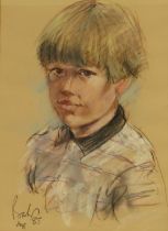 James Barker (20thC). Figure of a boy in polo shirt, pastel, signed and dated August 85, 35cm x 25cm