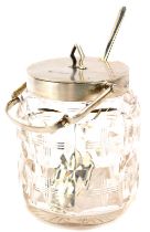 A George V cut glass and silver mounted condiment pot, of cylindrical form with silver mount and lid