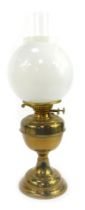 A late 19th/early 20thC Duplex brass oil lamp, with white milk glass shade, with chimney, 53.5cm hig