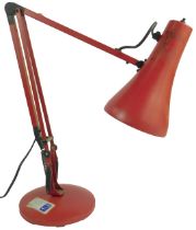 An Anglepoise type lamp, in red, 84cm high.