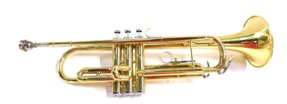 A Clarke brass trumpet, model M4015-1, stamped Made in China, cased.