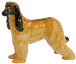 A Beswick pottery figure modelled as an Afghan Hound, printed marks, 14.5cm high.