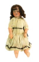 An early 20thC Armand Marseille doll, in cream embellished dress, impressed marks to head Armand Mar