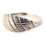 A 9ct gold dress ring, the ring head of boat shaped form with etched markings, ring size S, 2g all i