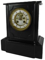 A Victorian black slate mantel clock, the circular white enamel dial bearing Roman numerals, eight d