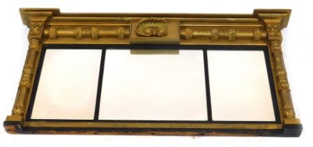 A Regency gilt wood over mantel mirror, with break front pediment, tulip and turned supports, and th