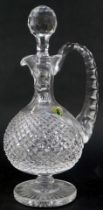 A Waterford crystal cut glass claret decanter, with stopper, 32cm high, with certificate numbered 18