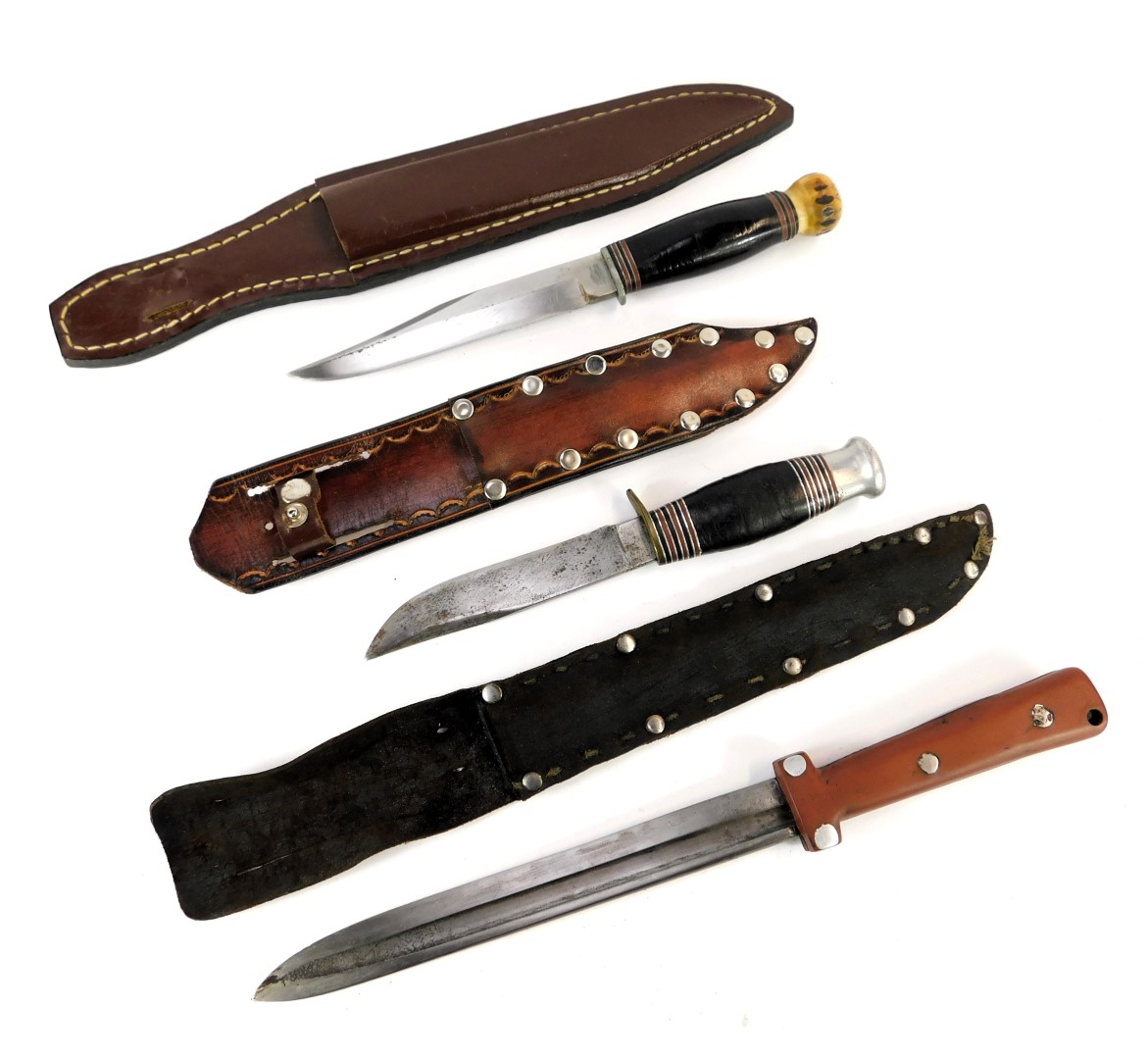 Two sheath knives and a bayonet, one sheath knife the blade stamped George Butler & Co Sheffield Eng