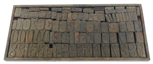 A group of wooden letterpress numbers, circa 90 printing blocks of differing sizes, the largest 8.5c