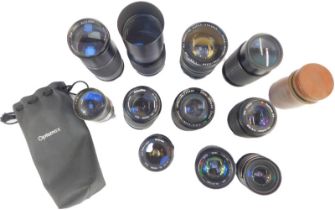 A quantity of camera lenses, various makers and sizes, makers to include Tokina, Danubia, Prinzflex,