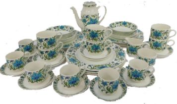 A Midwinter part coffee, tea and dinner service, each piece decorated with blue and green flowers ag