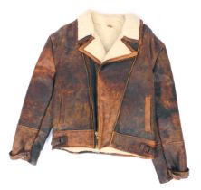 A brown leather flying type jacket, with sheepskin interior, underarm measurement approx 44cm.