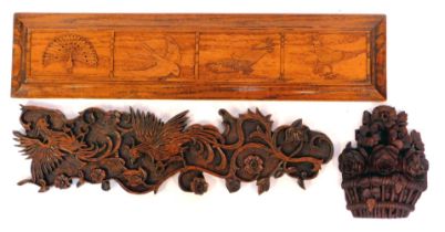 A carved oak panel, of rectangular form, depicting four birds, to include eagle, peacock, etc, 79cm