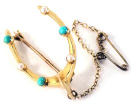 A wishbone brooch, the wishbone set with turquoise and seed pearl, with single pin back and safety c