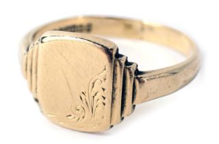 A 9ct gold signet ring, the rectangular ring head with scroll cornered design and shaped Art Deco st