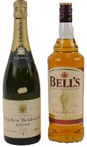 A bottle of Bell's Scotch Whisky, 1 litre, together with a bottle of Charles Heidsieck Champagne.