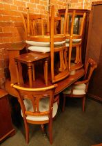 A group of furniture, to include an extending twin pedestal dining table, a set of six chairs, magaz