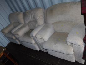 Three armchairs, upholstered in cream fabric, 85cm wide.