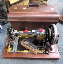 A cased Jones sewing machine.