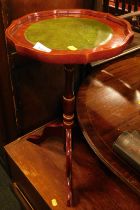 A wine table, the top with green leatherette inset panel, 52cm high.